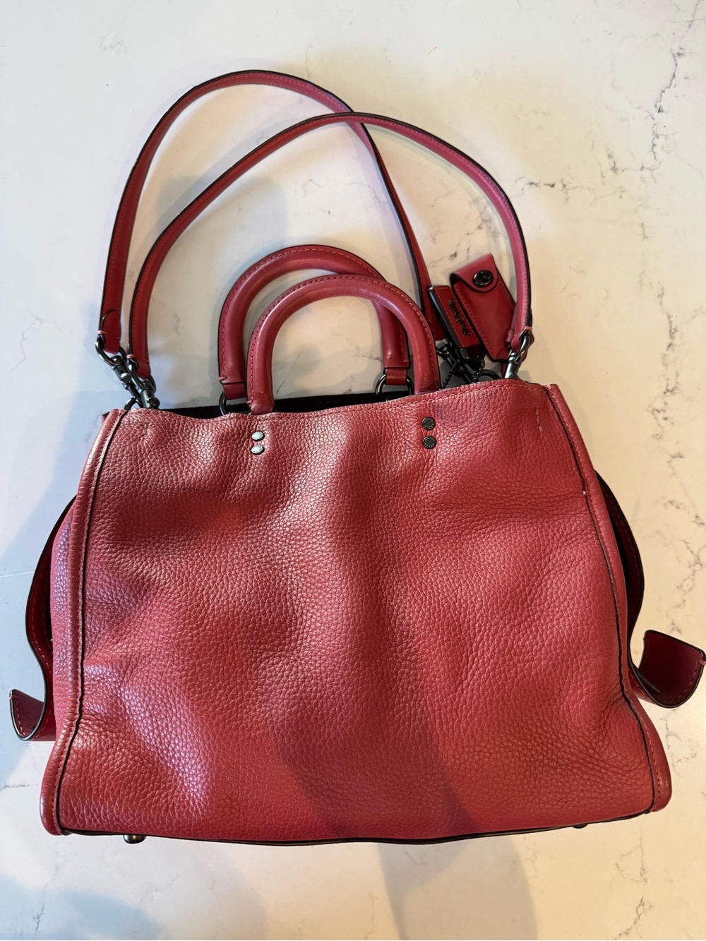 Coach Rogue 30 in “washed red” with pewter hardware